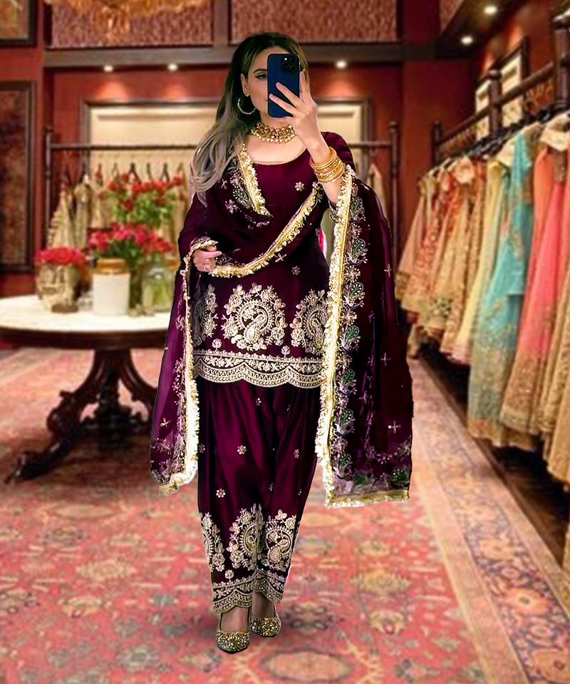 Purple heavy embroidered festive suit