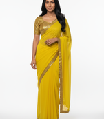 Yellow sequenced work georgette saree with blouse piece.