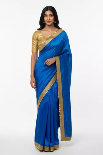 Blue sequenced work georgette saree with blouse piece.