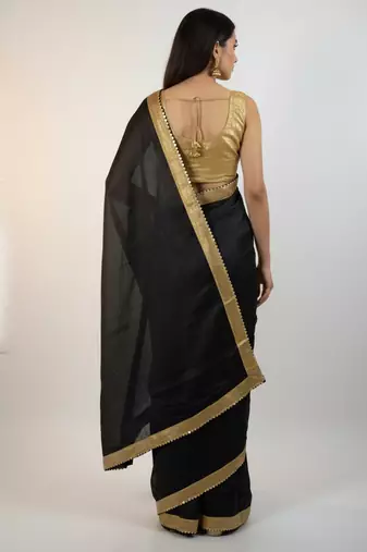 Black sequenced work georgette saree with blouse piece.