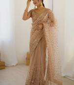 premium golden net saree with sequins & dori work