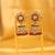 Maroon stone traditional jhumka earrings
