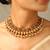 Traditional temple design gold tone choker necklace