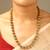 Traditional gold bead long necklace