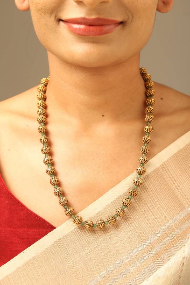 Traditional gold bead long necklace