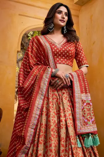 ORANGE Elegant Tasar Silk Lehenga Set with Iconic Sparkle & Lace Border   Blouse & Tassel Dupatta