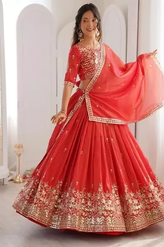 orange  designer lehenga choli with embroidered border
