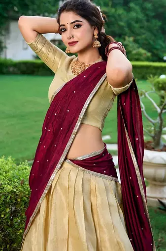 light-gold lehenga with maroon dupatta