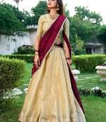 light-gold lehenga with maroon dupatta