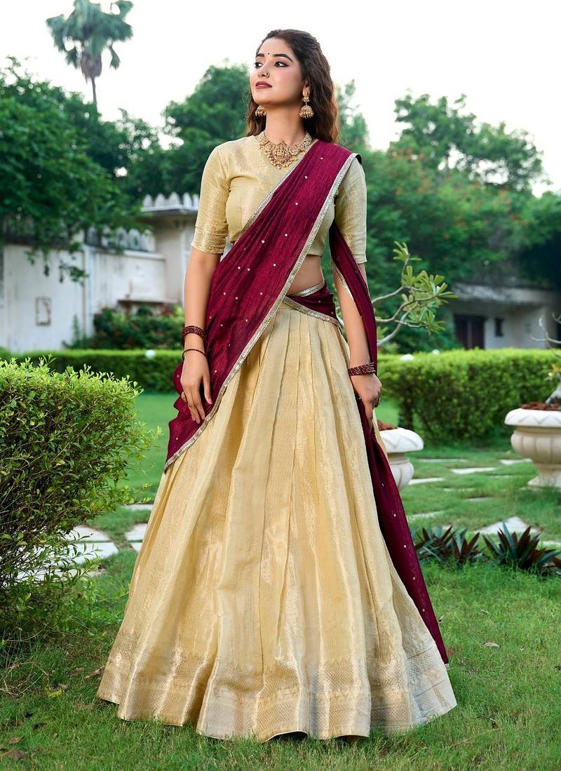 light-gold lehenga with maroon dupatta