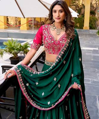 dark-green lehenga with pink embroidered blouse 2