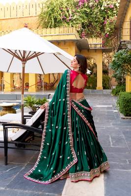 dark-green lehenga with pink embroidered blouse 3