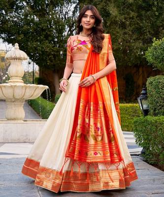 off-white lehenga with orange dupatta 1