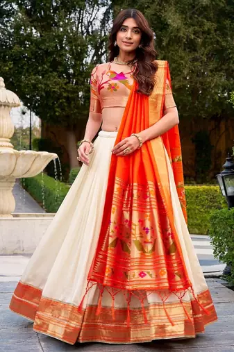 off-white Lehenga with Orange Dupatta