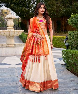 off-white lehenga with orange dupatta 2