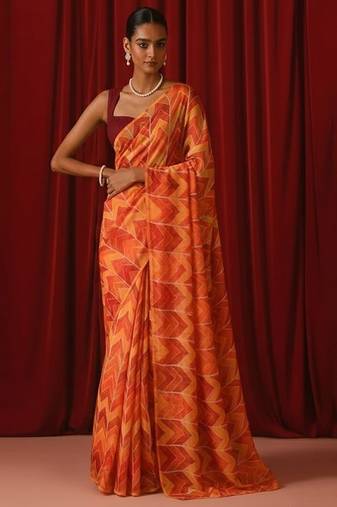 Orange printed georgette pre draped saree set