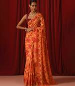 Orange printed georgette pre draped saree set