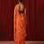 Orange printed georgette pre draped saree set