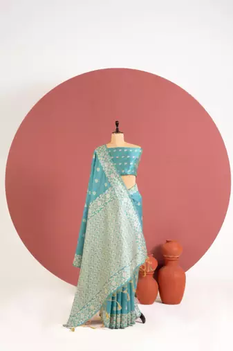 teal color art silk saree with printed blouse