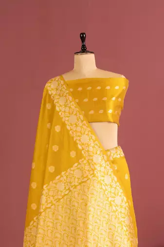yellow color art silk saree with printed blouse