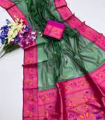 green color tissue art silk saree with contrast blouse