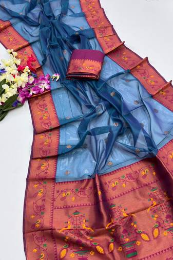 teal color tissue art silk saree with contrast blouse