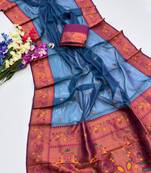 teal color tissue art silk saree with contrast blouse