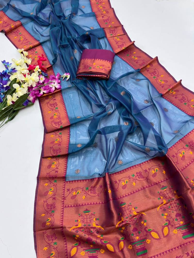 teal color tissue art silk saree with contrast blouse