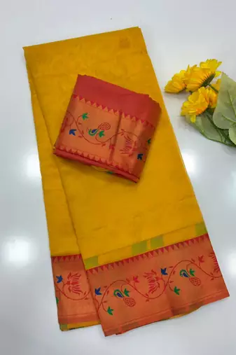 yellow color tissue art silk saree with contrast blouse