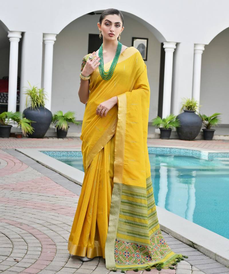 yellow color khadi art silk saree with contrast blouse