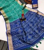 blue color printed art silk saree with contrast blouse
