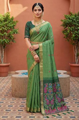 green  soft pure muga cotton  saree with meenakari  weaving  motifs and contrast blouse