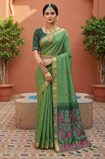 green  soft pure muga cotton  saree with meenakari  weaving  motifs and contrast blouse