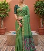 green  soft pure muga cotton  saree with meenakari  weaving  motifs and contrast blouse