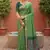 green  soft pure muga cotton  saree with meenakari  weaving  motifs and contrast blouse