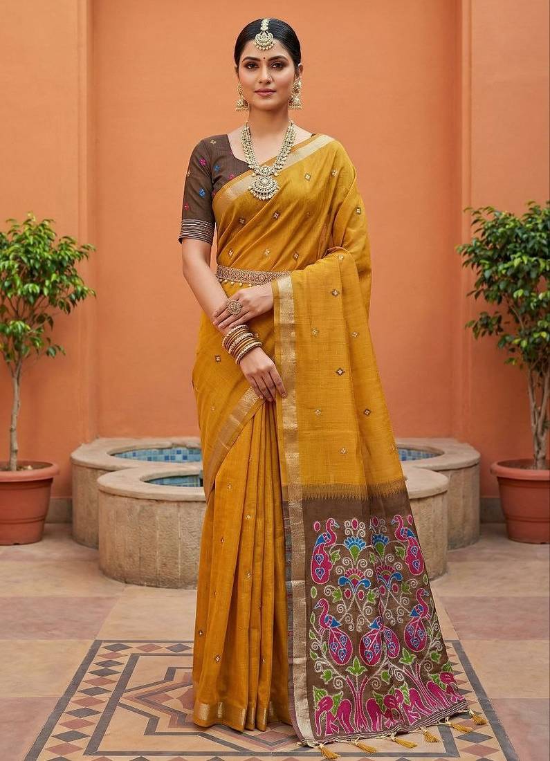rust  soft pure muga cotton  saree with meenakari  weaving  motifs and contrast blouse