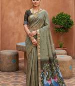 green  soft pure muga cotton  saree with meenakari  weaving  motifs and contrast blouse