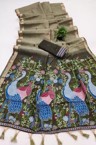green soft muga cotton saree with meenakari weaving motifs and contrast blouse