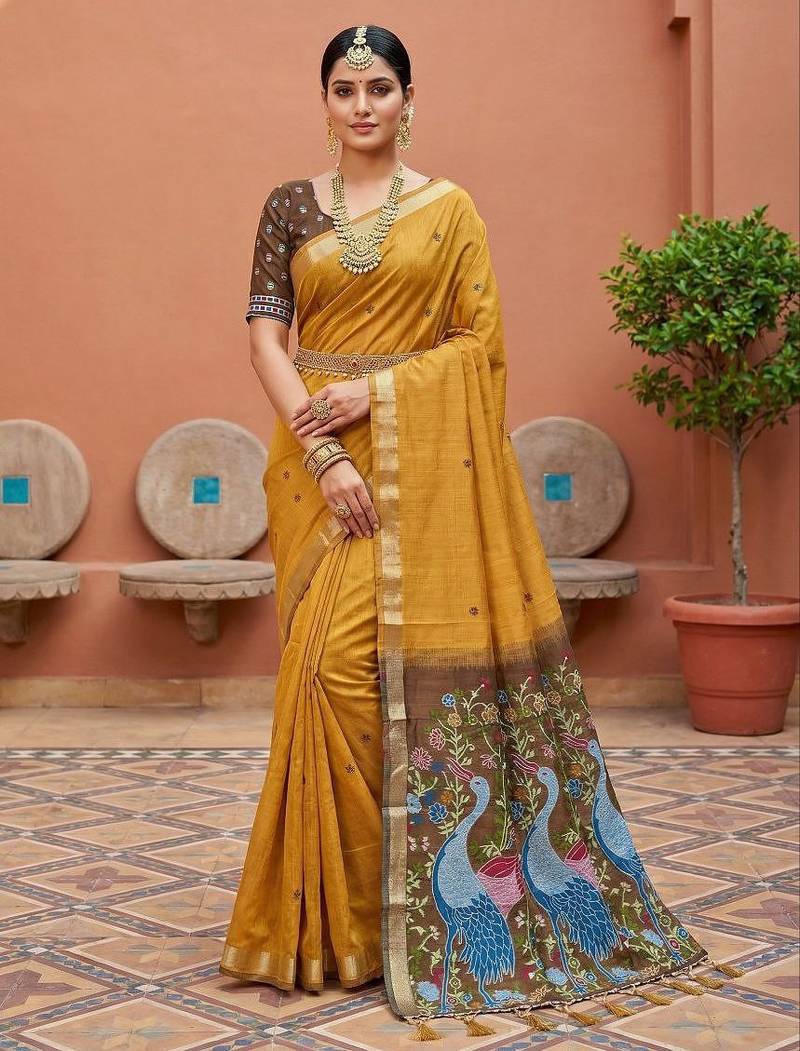 yellow  soft pure muga cotton  saree with meenakari  weaving  motifs and contrast blouse