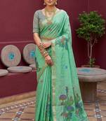 green  soft pure muga cotton  saree with meenakari  weaving  motifs and contrast blouse