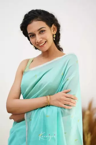 Turquoise linen slub jaquard designer saree with blouse