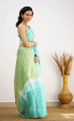 Turquoise linen slub jaquard designer saree with blouse 4