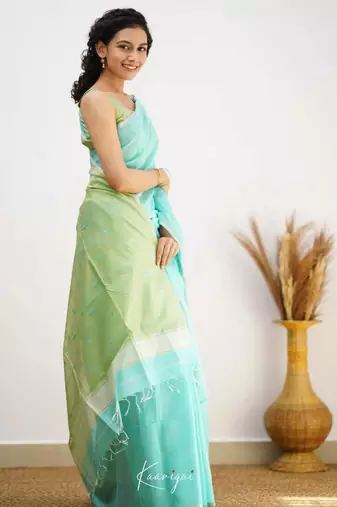 Turquoise linen slub jaquard designer saree with blouse