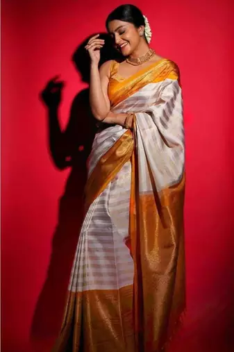 Off white soft silk blend banarasi jacuard work designer saree with blouse