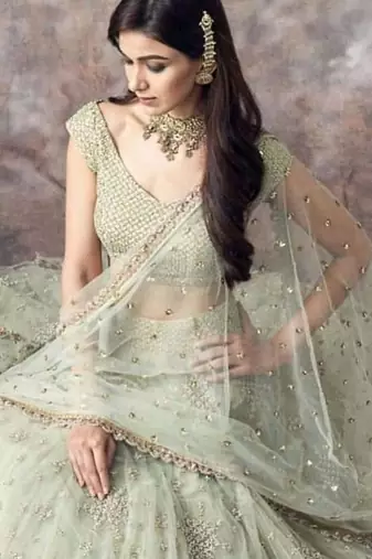 pista green soft net embroidery work lehenga choli set with dupatta