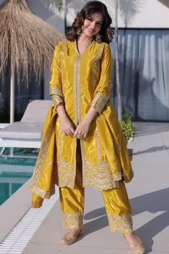 Splendid Mustard Yellow Zari Work Silk Haldi Wear Pant Suit With Dupatta