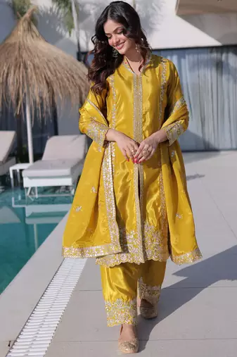Splendid Mustard Yellow Zari Work Silk Haldi Wear Pant Suit With Dupatta
