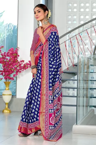 Hand block print with hevay zari bodar sarees