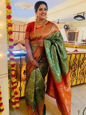 Rama green zari woven silk blend saree 4