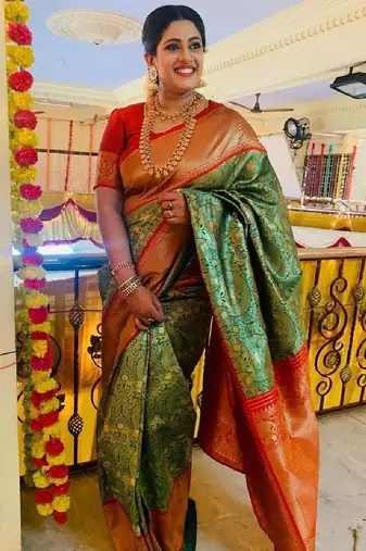 Rama green zari woven silk blend saree
